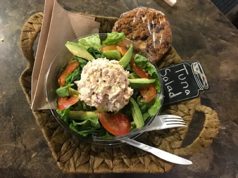 Fresh salad with avocado, tomato and greens served at Makepeace Farms cafe