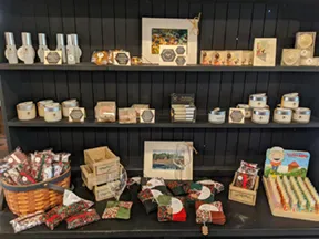 Shelves of cranberry-themed gifts and local artisan goods at Makepeace Farms gift shop