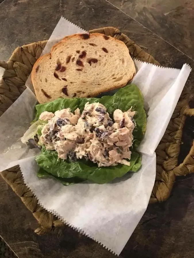 Cranberry Walnut Chicken Salad sandwich on cranberry bread at Makepeace Farms