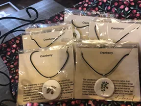 Handmade cranberry-themed necklace at Makepeace Farms gift shop